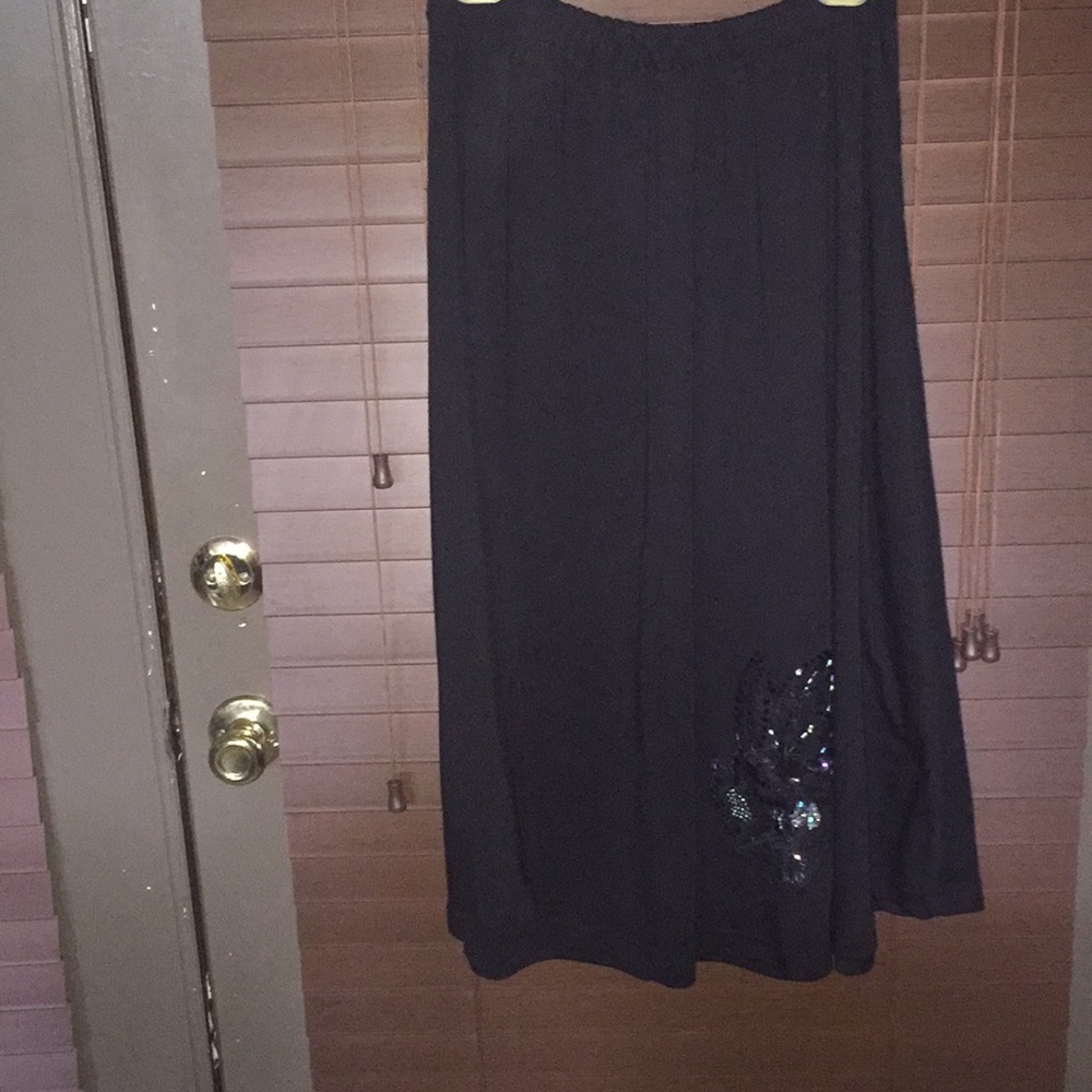 Black  long skirt with butterfly deco.